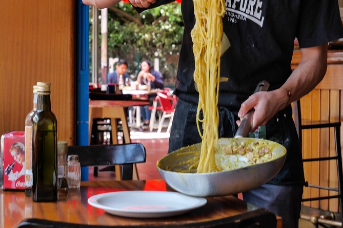 Make Pasta Carbonara from Scratch in a Jazz Club in Venice - Dinner and drinks: wine or prosecco while you cook